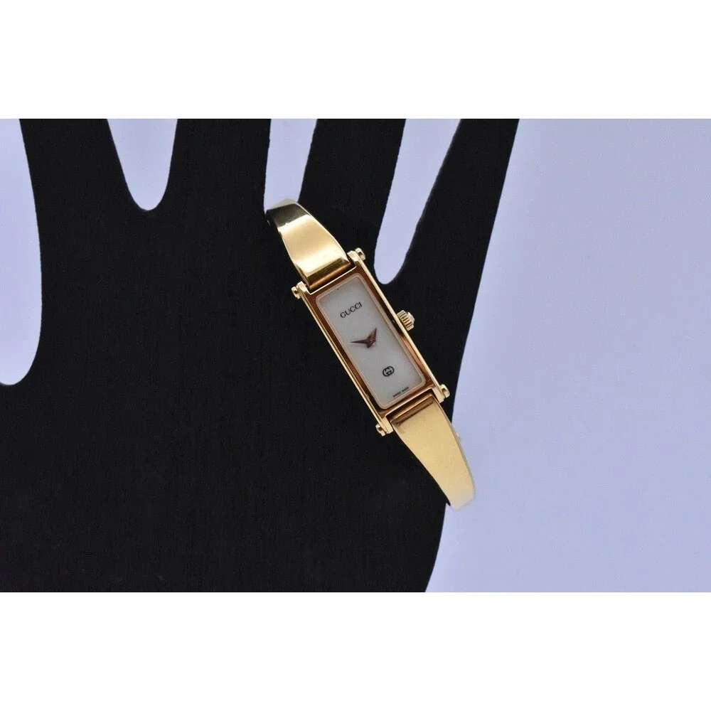 Vintage Gucci 1500L Ladies Gold Tone Bangle Watch Cream Dial Swiss Quartz